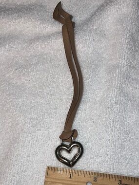 Brighton vintage leather key fob bag charm in  a distinct open-heart design.